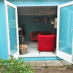Vakantiehuis Boshuis Turquoise / Smaakvol Genieten Op De Veluwe